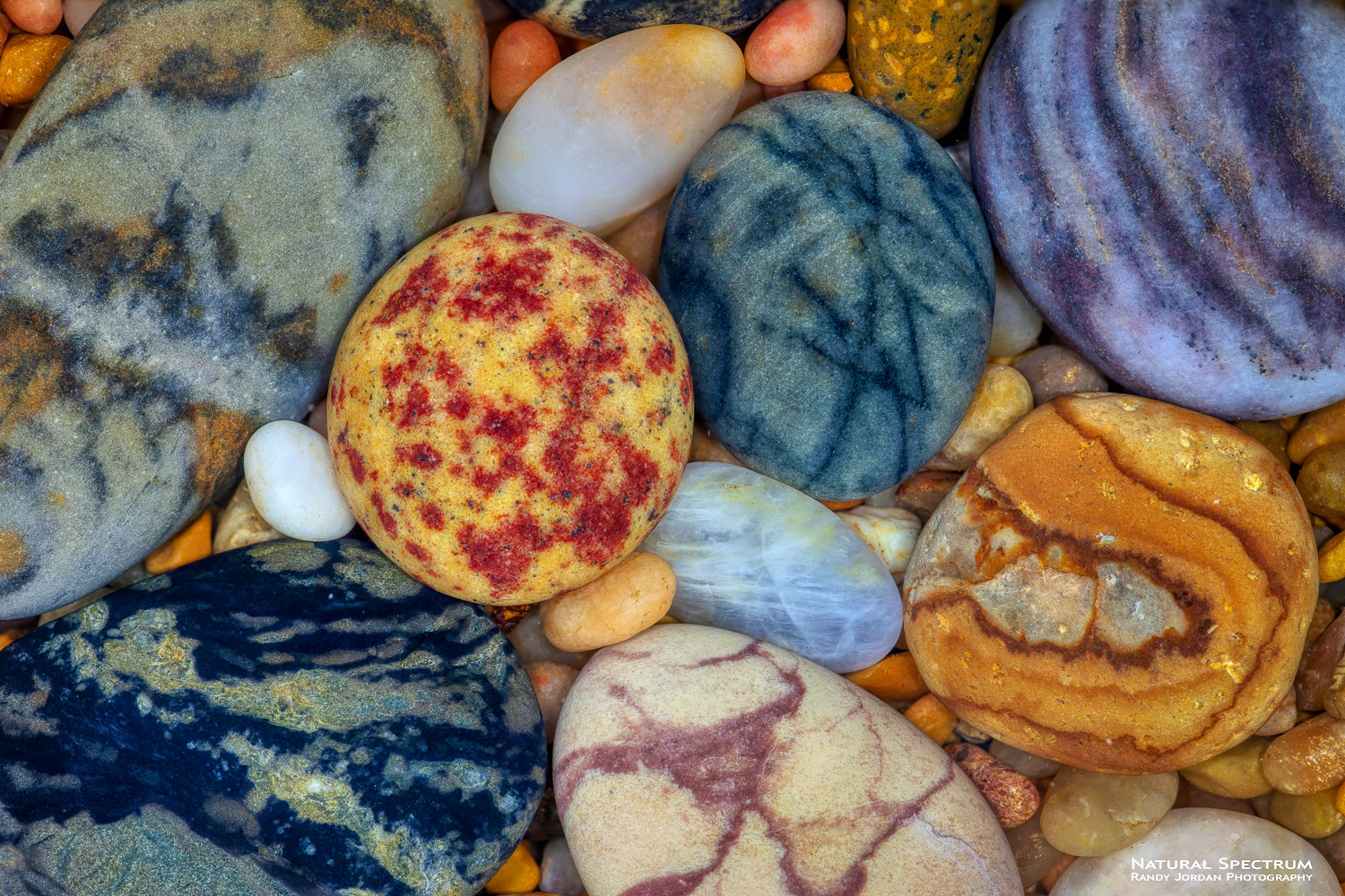 The power of the ocean and time create a galaxy of colors and shapes for beach rocks.