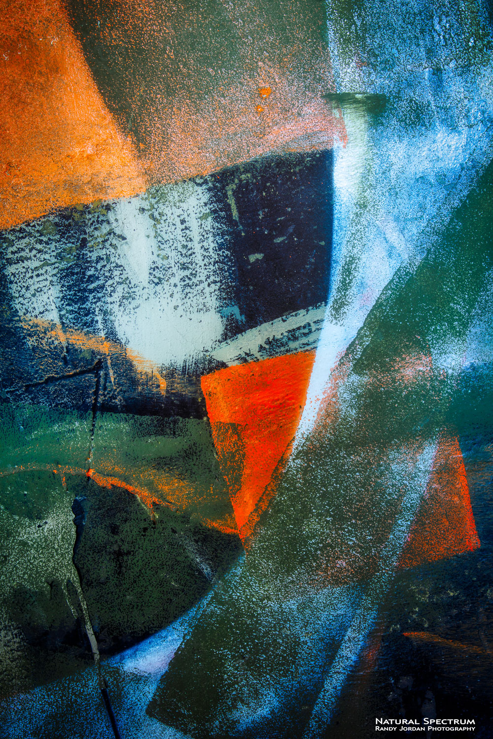 Abstract expression of weathering effects and graffiti on the concrete walls, historical military bunker.